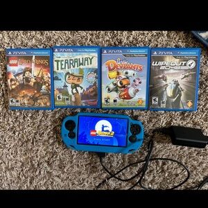 Sony PlayStation Vita PCH-1001 Black Handheld System Plus 5 Games
